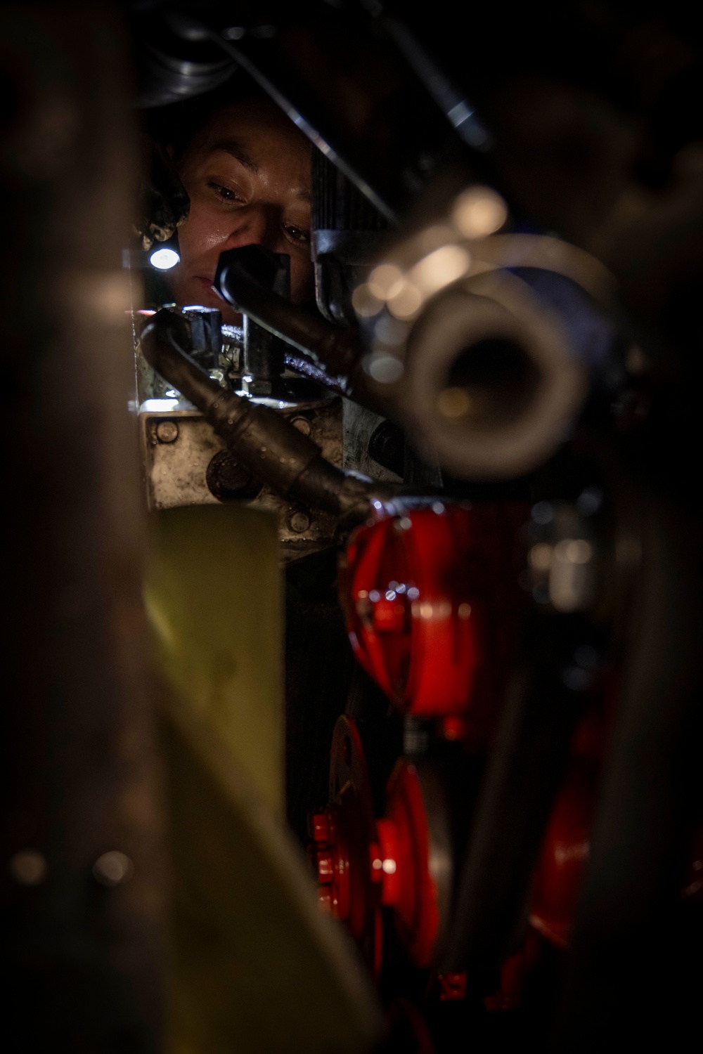 Nimitz Sailor Inspects Mobile Electric Powerplant Engine