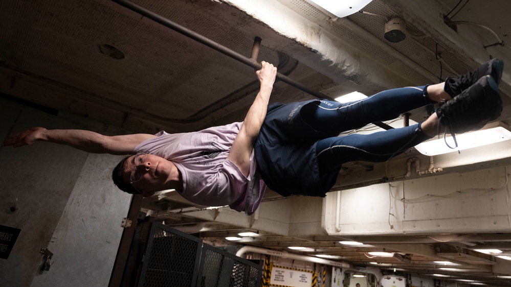 Nimitz Sailor Practices Gymnastic Exercise Routine