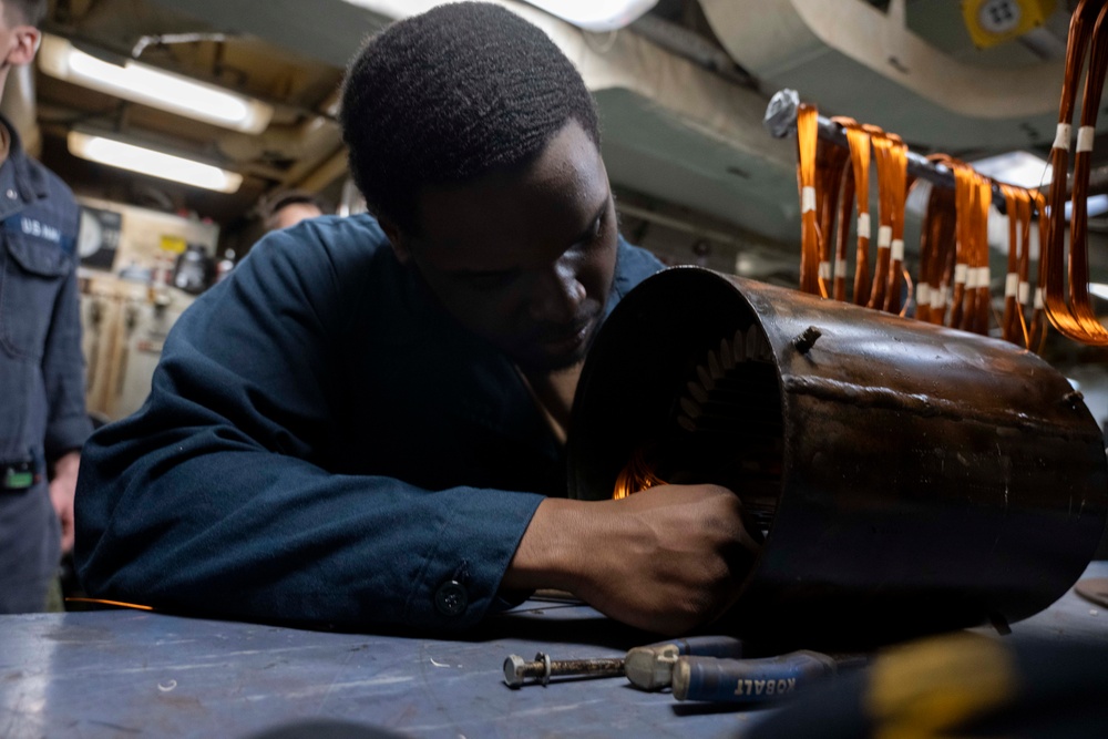 Nimitz Sailor Rewires Motor Component