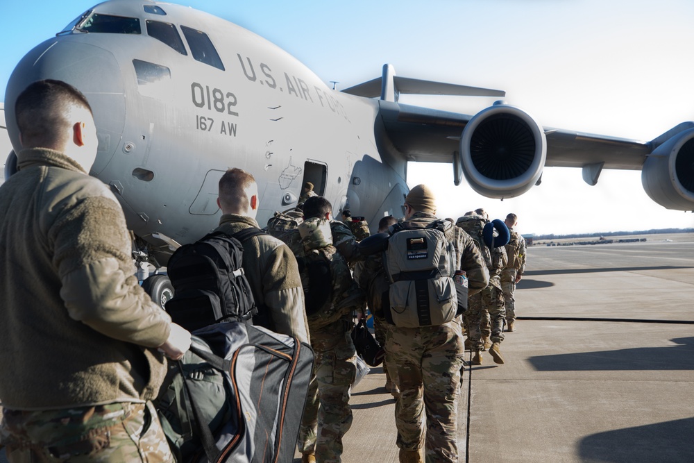 West Virginia, D.C. Soldiers and Airmen board flight to travel to Qatar for the Best Warrior Competition