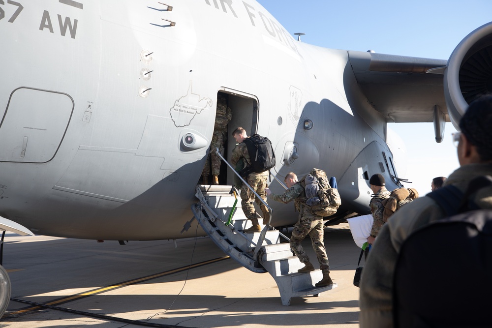 West Virginia, D.C. Soldiers and Airmen board flight to travel to Qatar for the Best Warrior Competition