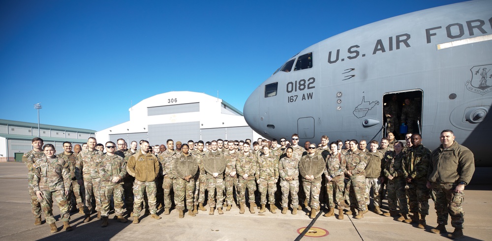 West Virginia, D.C. Soldiers and Airmen board flight to travel to Qatar for the Best Warrior Competition