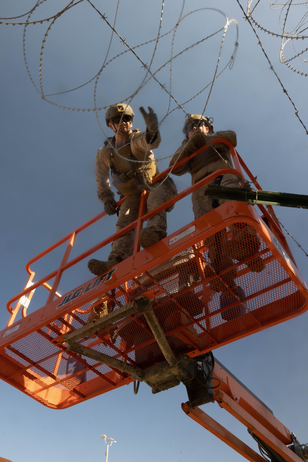 U.S. Marines place concertina wire to assist with border security mission