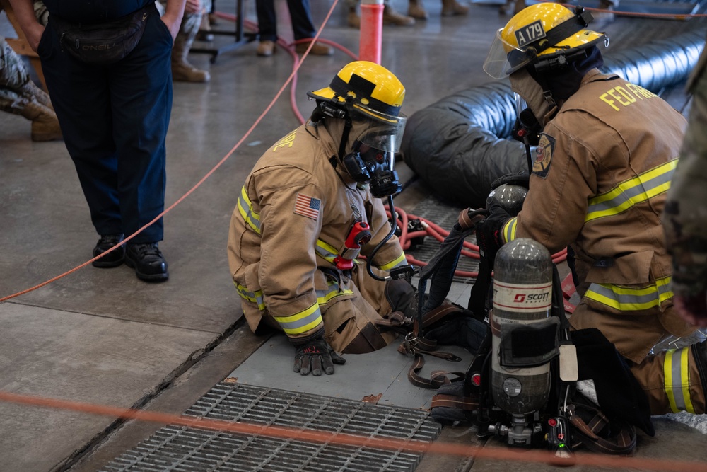 15th &amp; 154th Maintenance Squadron conduct a confined space exercise on JBPHH