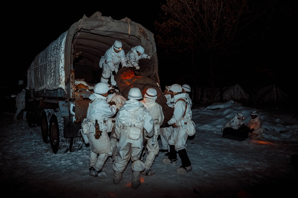 JGSDF Members Unload Tent