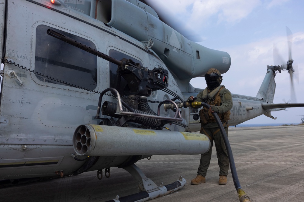 Marines arm and refuel for aerial gunnery target shoot off the coast of Okinawa