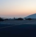 Black Hawk and Pave Hawk Helicopters on Airstrip