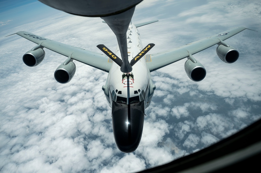 RC-135 refueled above the clouds