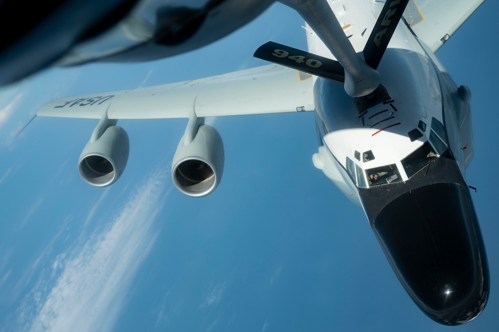 RC-135 refueled above the clouds