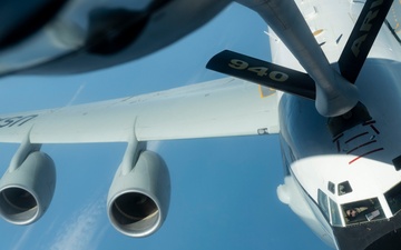 RC-135 refueled above the clouds