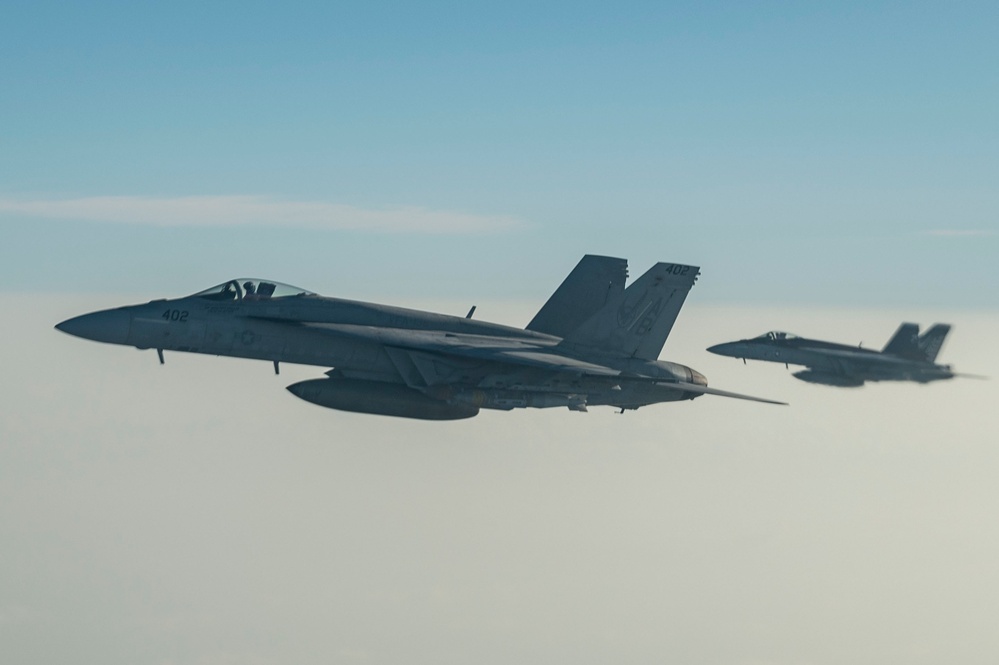 U.S. Navy F/A-18 Super Hornets refueled