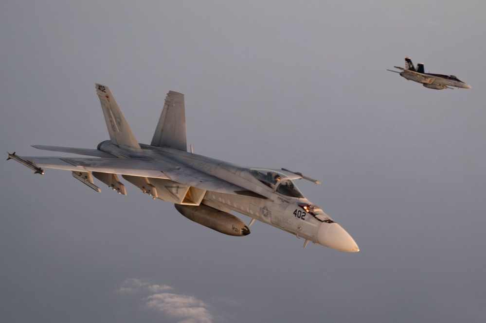 U.S. Navy F/A-18 Super Hornets refueled