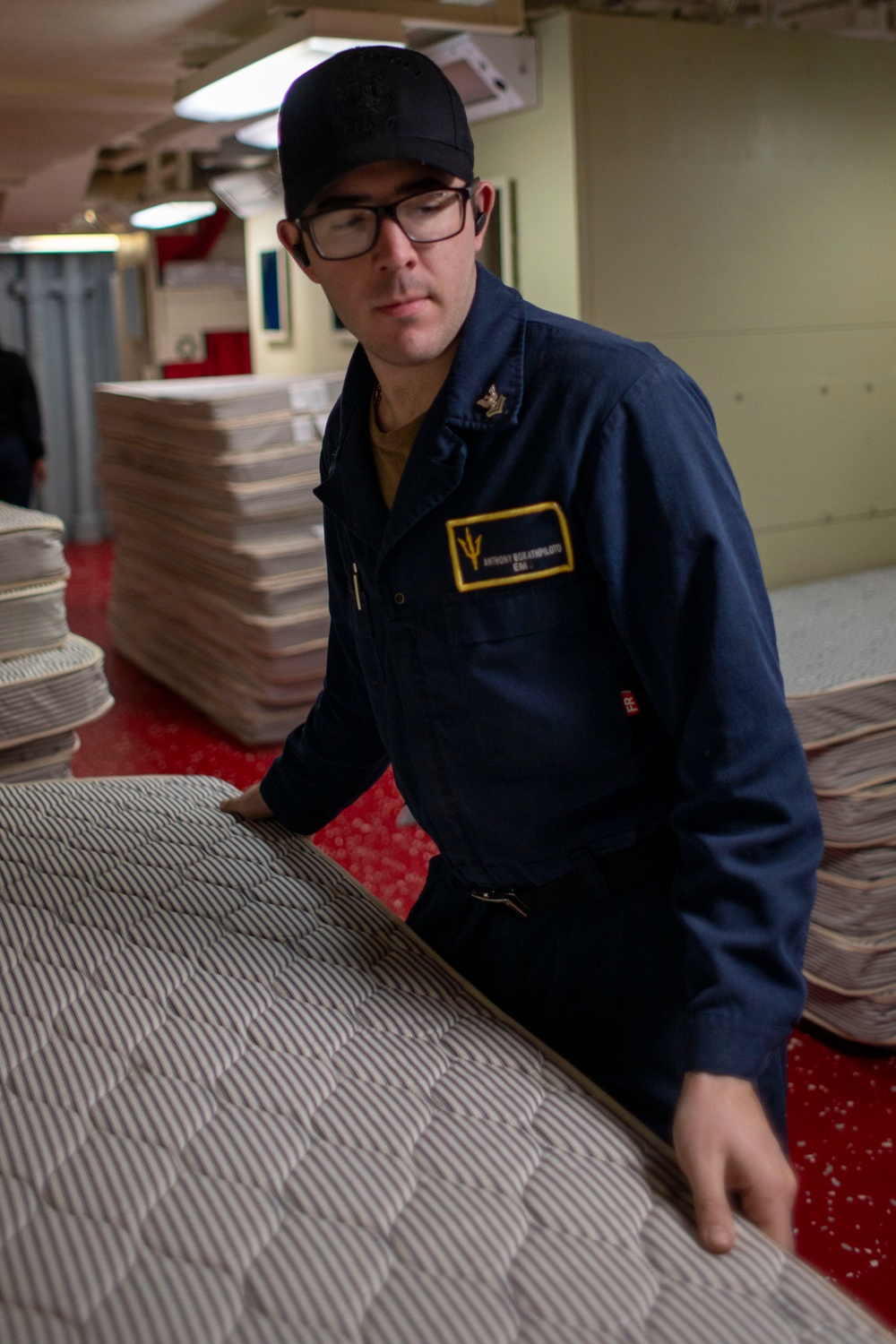 USS Tripoli Sailors Conduct Inspections and Move Mattresses