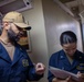 USS Tripoli Sailors Conduct Inspections and Move Mattresses