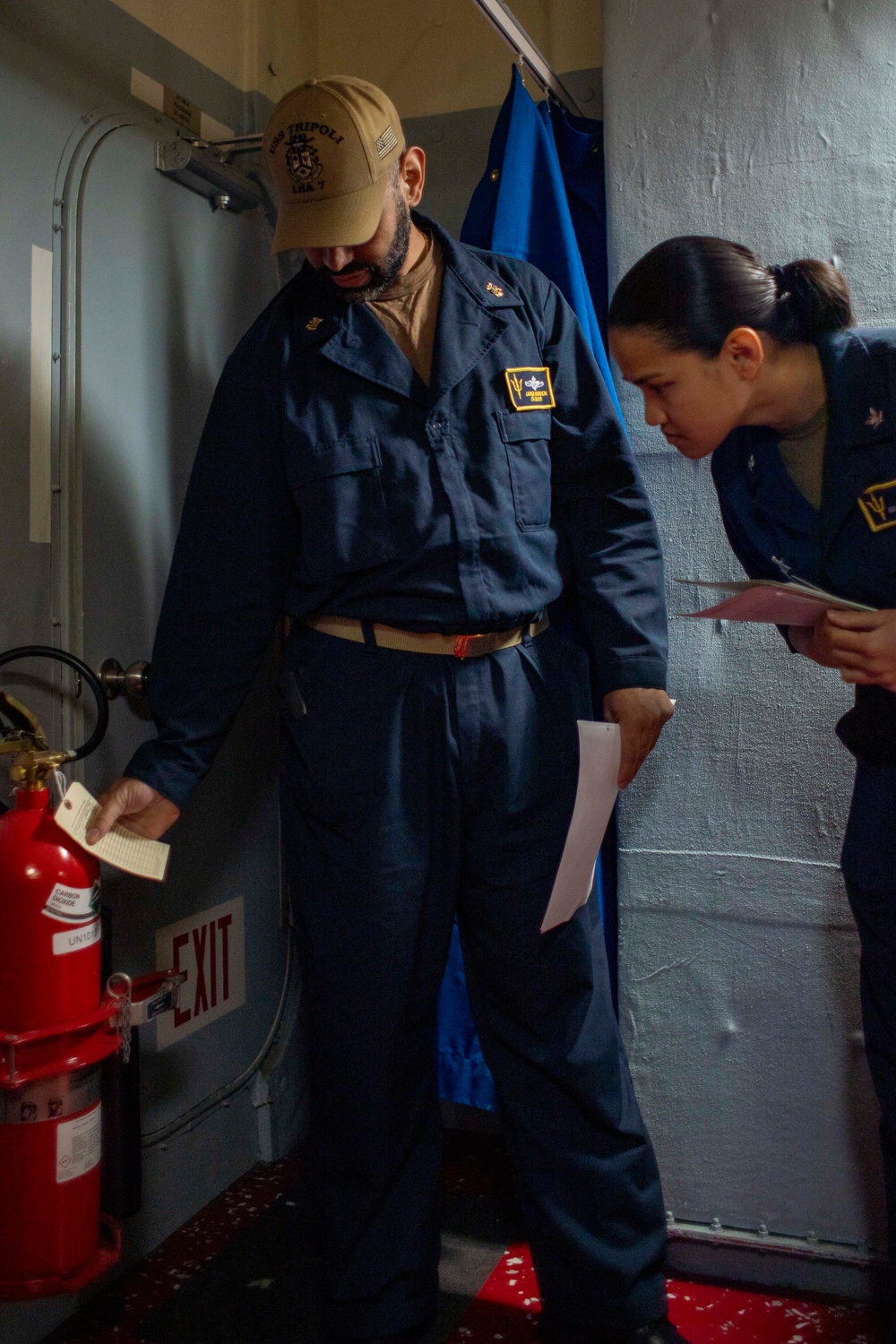 USS Tripoli Sailors Conduct Inspections and Move Mattresses