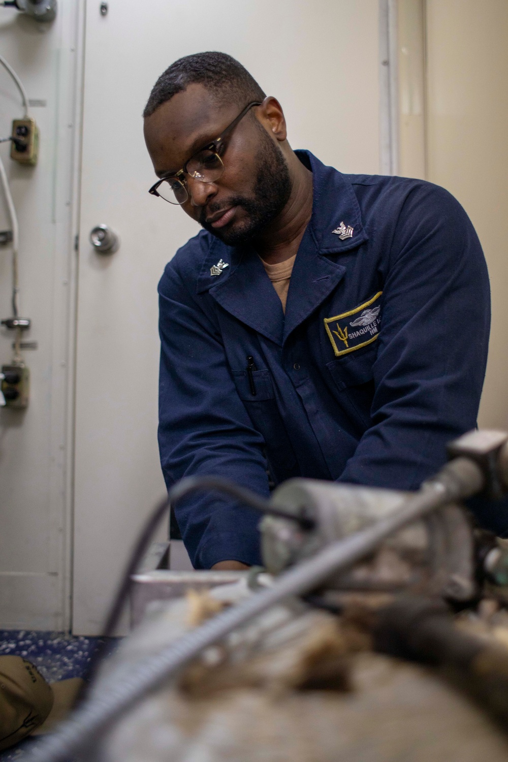 USS Tripoli Sailors Conduct Inspections and Move Mattresses