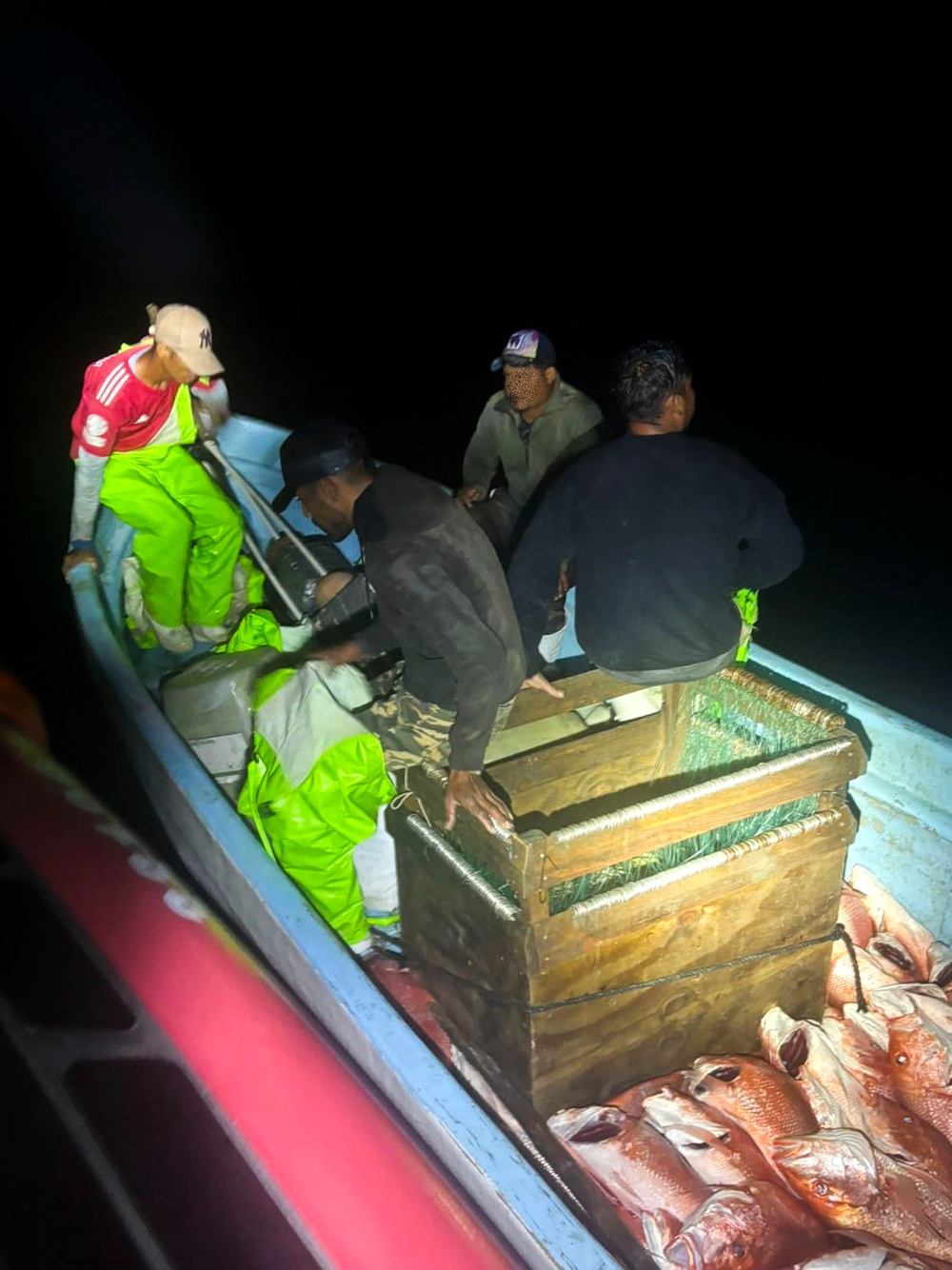 Coast Guard detains 11 Mexican fisherman, seizes 1350 pounds of illegally caught fish and 9 sharks off Texas