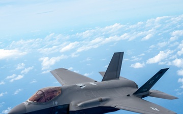 U.S., JASDF and RAAF aircraft fly in formation during CN25