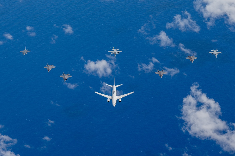 U.S., JASDF and RAAF aircraft fly in formation during CN25