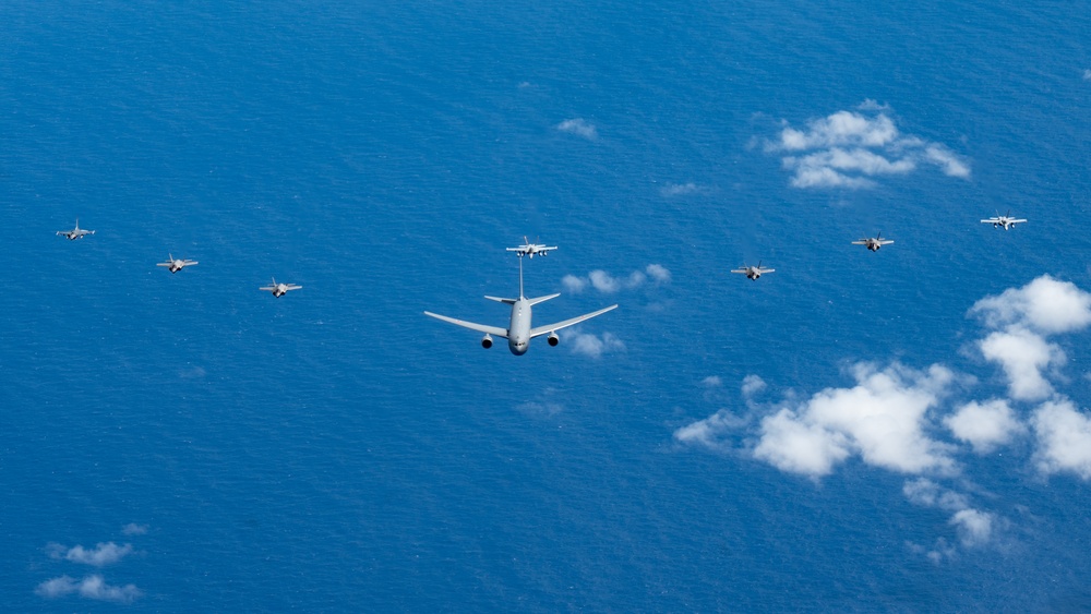 U.S., JASDF and RAAF aircraft fly in formation during CN25