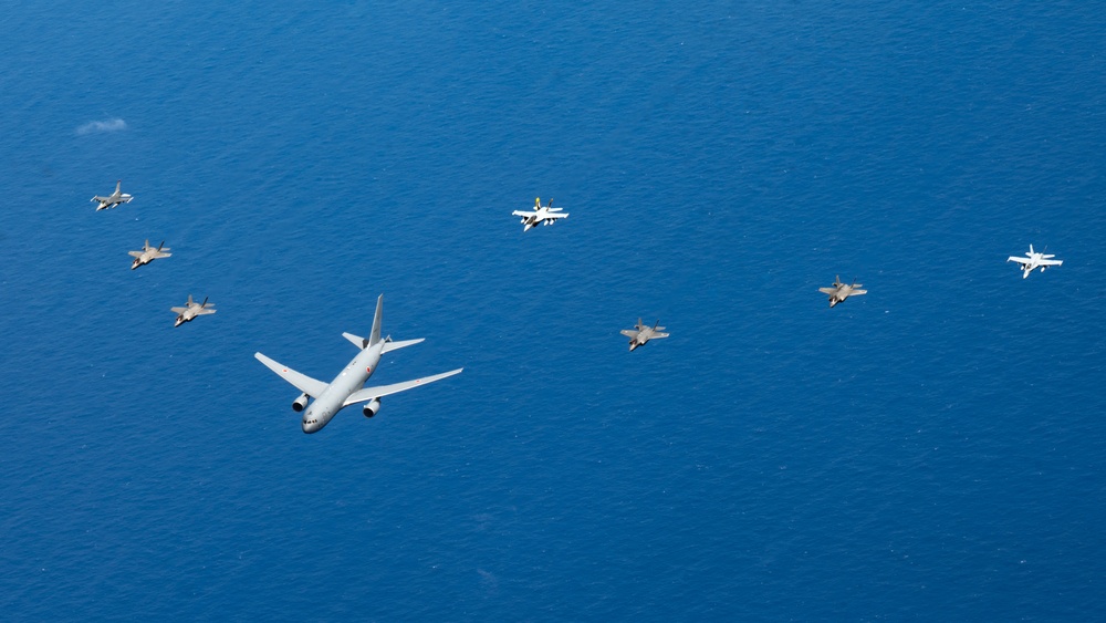 U.S., JASDF and RAAF aircraft fly in formation during CN25