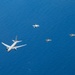 U.S., JASDF and RAAF aircraft fly in formation during CN25