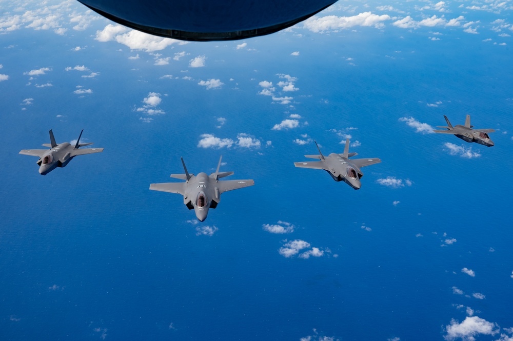 U.S., JASDF and RAAF aircraft fly in formation during CN25