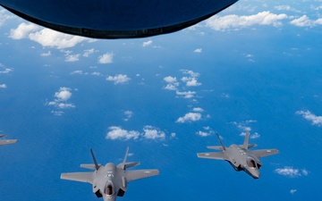 U.S., JASDF and RAAF aircraft fly in formation during CN25