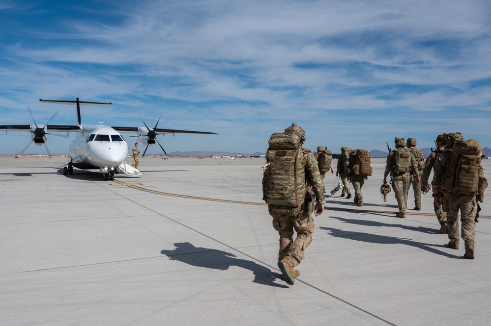 U.S. Air Force and Italian Air Commandos conduct medical training on a C-146A Wolfhound during Emerald Warrior 25.1