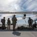 U.S. Air Force and Italian Air Commandos conduct medical training on a C-146A Wolfhound during Emerald Warrior 25.1