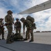 U.S. Air Force and Italian Air Commandos conduct medical training on a C-146A Wolfhound during Emerald Warrior 25.1