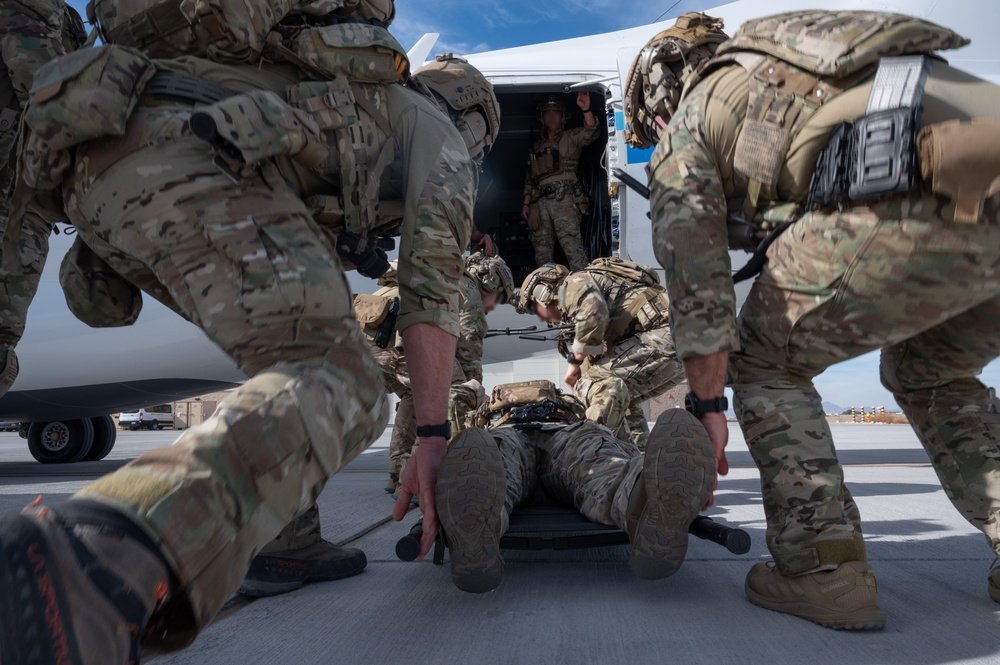 U.S. Air Force and Italian Air Commandos conduct medical training on a C-146A Wolfhound during Emerald Warrior 25.1