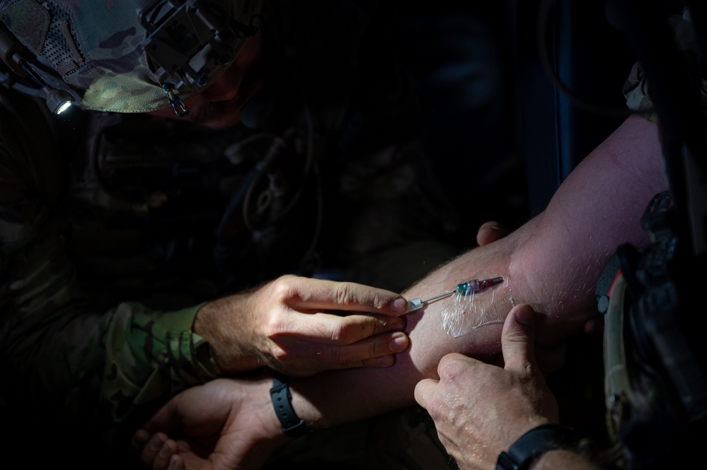 U.S. Air Force and Italian Air Commandos conduct medical training on a C-146A Wolfhound during Emerald Warrior 25.1