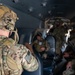 U.S. Air Force and Italian Air Commandos conduct medical training on a C-146A Wolfhound during Emerald Warrior 25.1