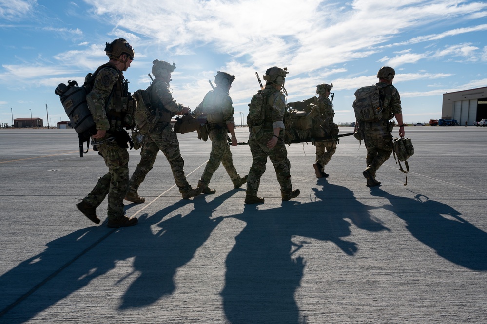 U.S. Air Force and Italian Air Commandos conduct medical training on a C-146A Wolfhound during Emerald Warrior 25.1