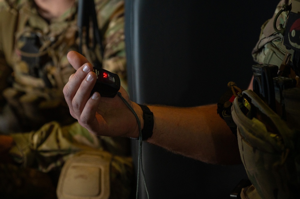 U.S. Air Force and Italian Air Commandos conduct medical training on a C-146A Wolfhound during Emerald Warrior 25.1