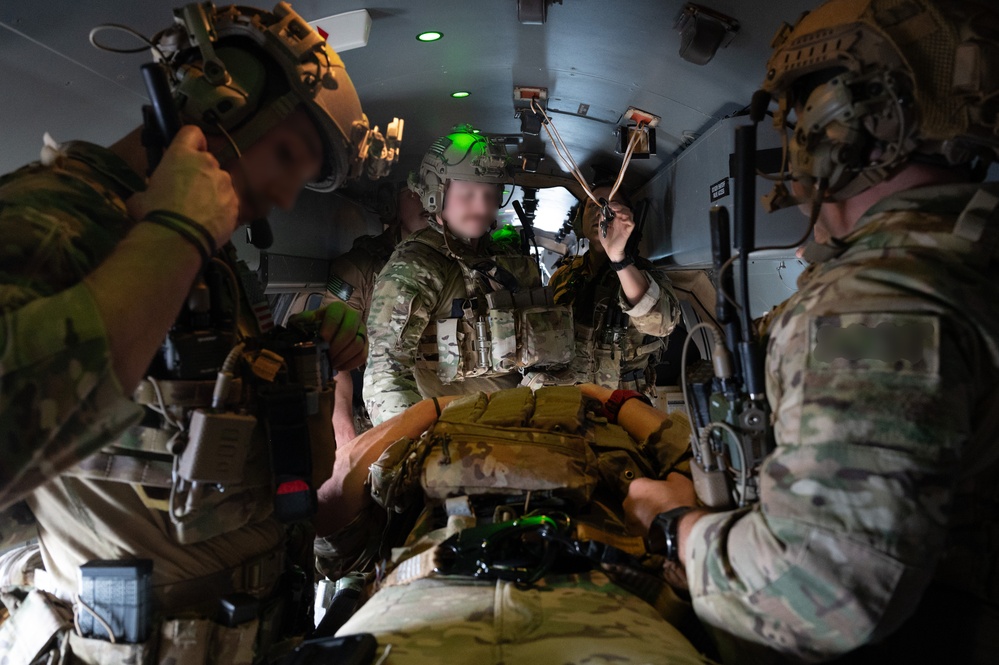 U.S. Air Force and Italian Air Commandos conduct medical training on a C-146A Wolfhound during Emerald Warrior 25.1