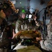 U.S. Air Force and Italian Air Commandos conduct medical training on a C-146A Wolfhound during Emerald Warrior 25.1