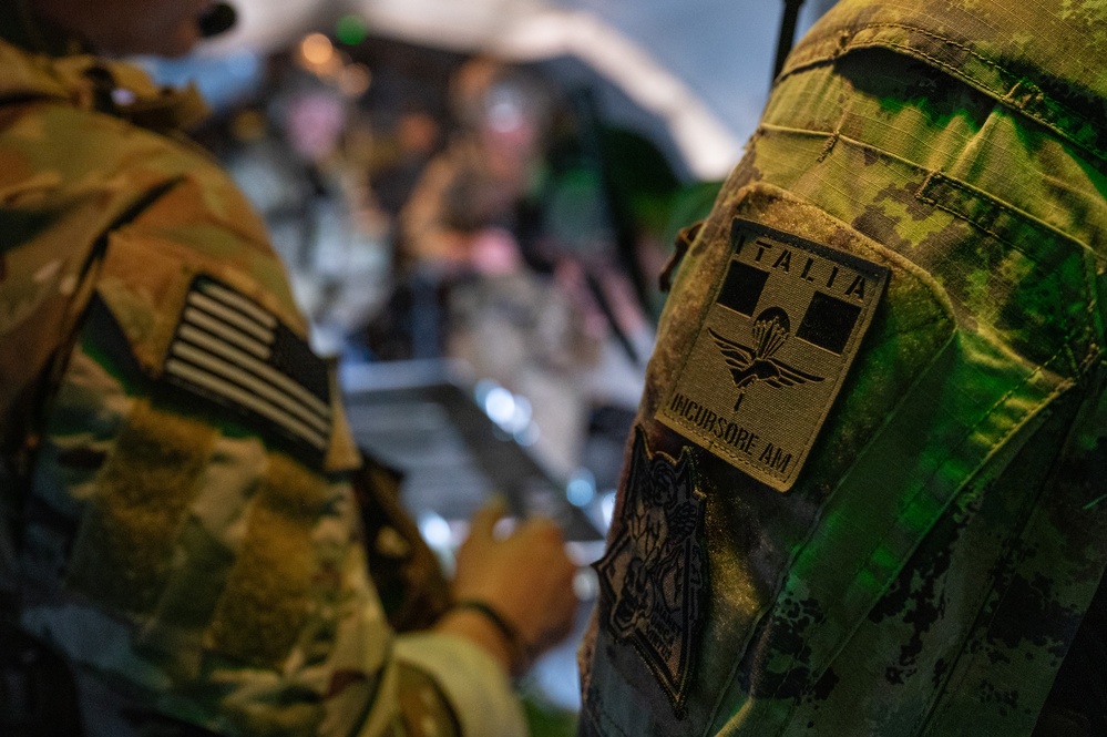 U.S. Air Force and Italian Air Commandos conduct medical training on a C-146A Wolfhound during Emerald Warrior 25.1