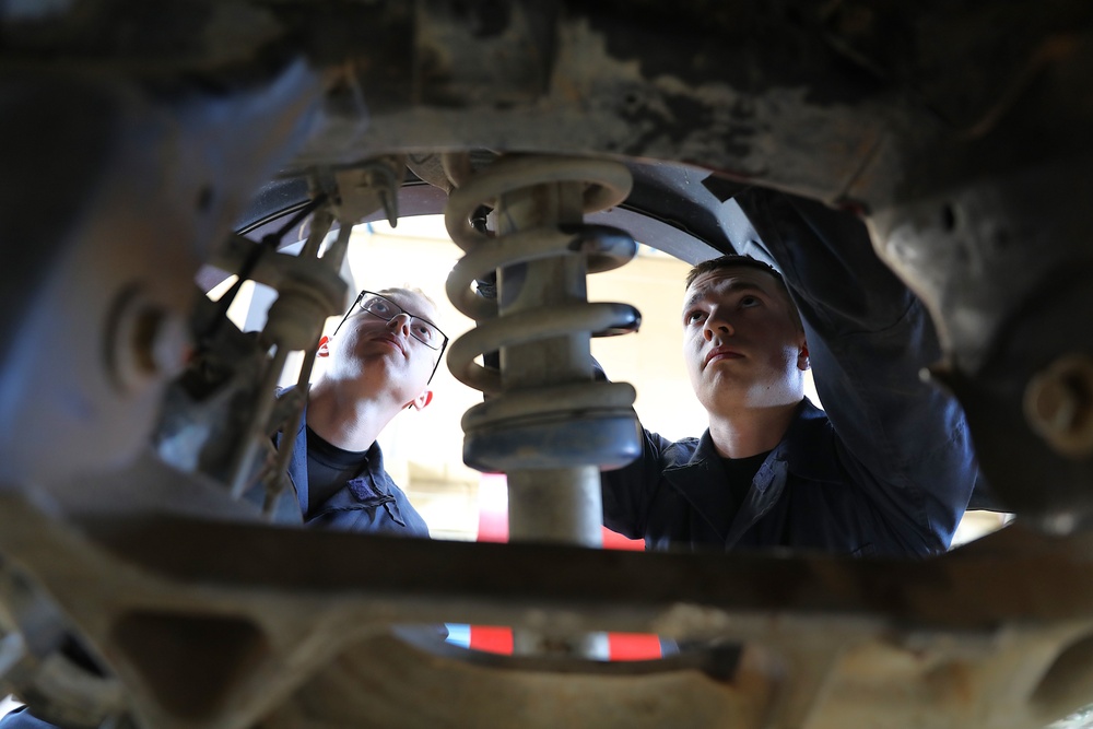 Soldiers keep U.S. Border Patrol vehicles in the mission