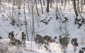 U.S. Army Soldiers move toward the objective