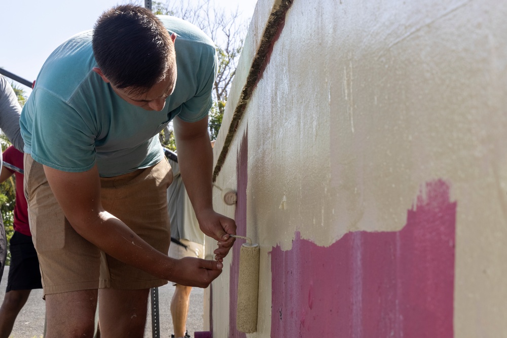 Marines, Sailors paint to revitalize Guam