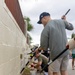 Marines, Sailors paint to revitalize Guam