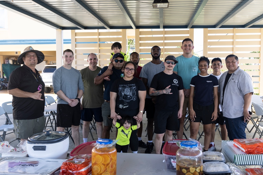 Marines, Sailors paint to revitalize Guam