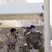 U.S. Army 1st Sgt. Christopher Vandergrift smiles while discussing the events of the Best Warrior Competition with National Service Academy 1st Lt. Ibrihim Al-Sulalti