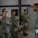 Admiral Alvin Holsey visits illegal aliens holding operations center at Naval Station Guantanamo Bay