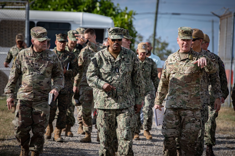 Admiral Alvin Holsey visits illegal aliens holding operations center at Naval Station Guantanamo Bay