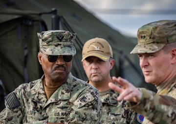 Admiral Alvin Holsey visits illegal aliens holding operations center at Naval Station Guantanamo Bay