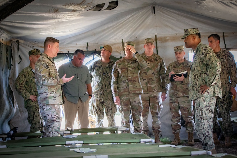 Admiral Alvin Holsey visits illegal aliens holding operations center at Naval Station Guantanamo Bay