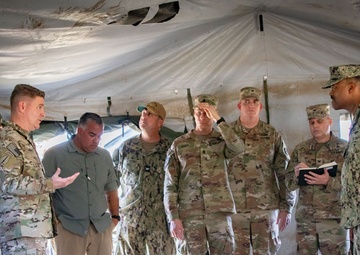 Admiral Alvin Holsey visits illegal aliens holding operations center at Naval Station Guantanamo Bay